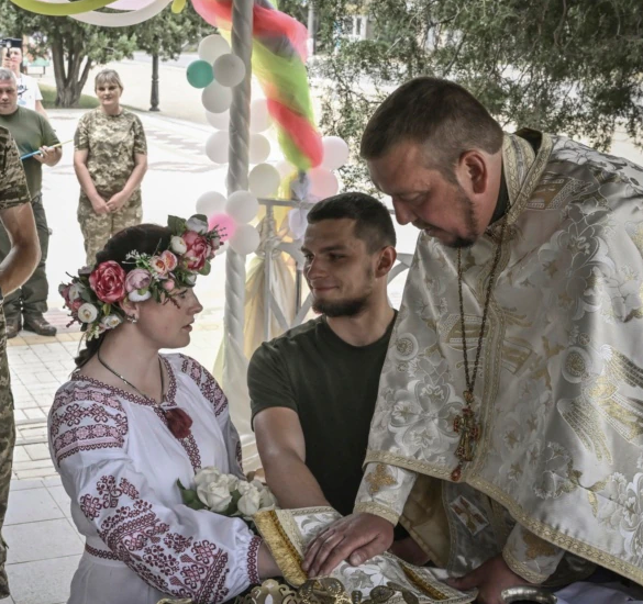 Life Goes On as Ukraine Army Holds War Weddings