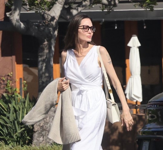 Angelina Jolie Went Grocery Shopping in a Dreamy White Wrap Dress