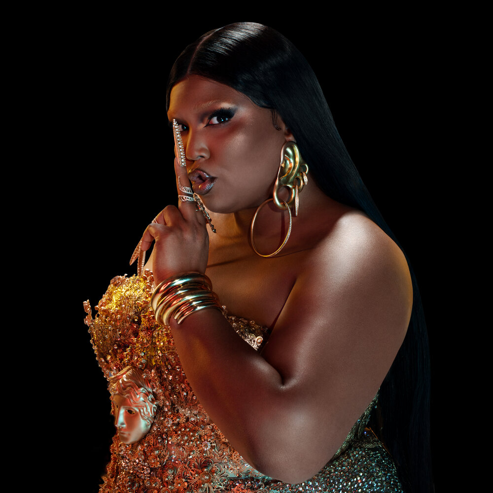 Lizzo Showed Off a New Yitty Thong, but It's the Wavy Partial Box Braids for Me