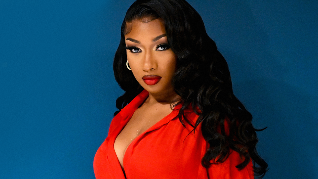 I Swear There's Actual Water Inside Megan Thee Stallion's Deep-Sea Manicure