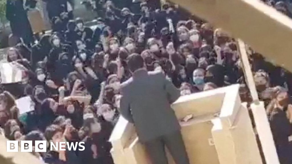 Iran protests: Schoolgirls heckle paramilitary speaker