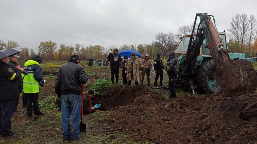 Mass grave with 17 bodies found in Kharkiv region